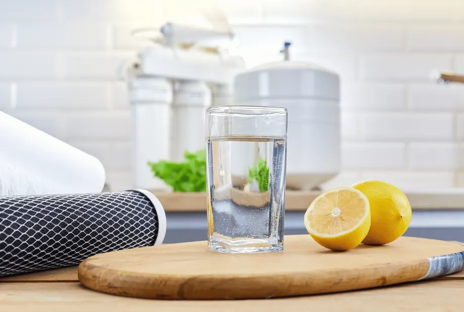 Water Filtration system and a glass of clean water